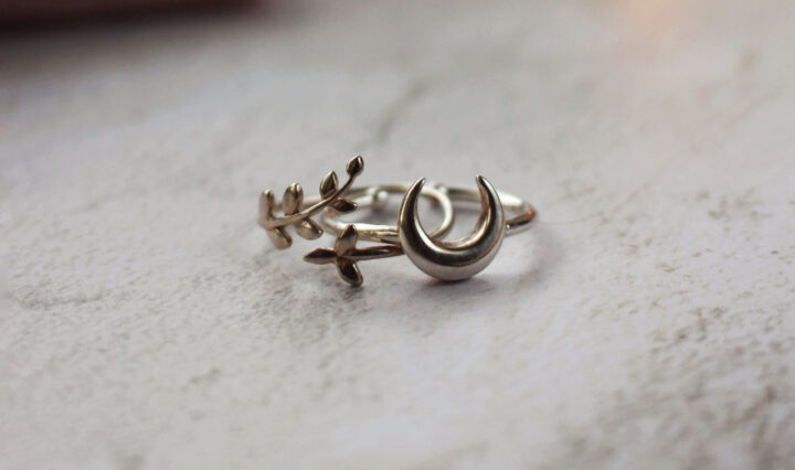 macro shot of silver rings on a table