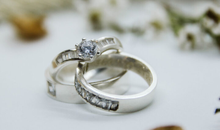 sterling silver bridal rings on white table